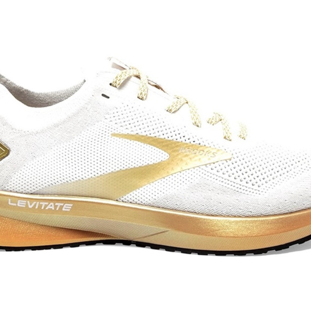 ladies size 7 gold and cream levitate